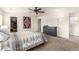 Spacious bedroom features plush carpet and a walk-in closet for optimal storage at 6276 Turnstone Pl, Castle Rock, CO 80104