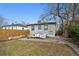 Backyard featuring a grass lawn and stone patio with outdoor seating at 1705 S Downing St, Denver, CO 80210