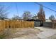 Fenced backyard and detached garage at 1705 S Downing St, Denver, CO 80210