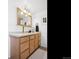 Bathroom with countertop sink and vanity with drawers for storage at 1705 S Downing St, Denver, CO 80210