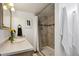 Bathroom with glass shower, tile surround and modern fixtures at 1705 S Downing St, Denver, CO 80210