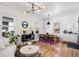 Sunlit living room featuring modern furnishings, hardwood floors, and contemporary decor at 1705 S Downing St, Denver, CO 80210