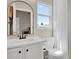 Bright bathroom featuring modern fixtures, a white vanity, a toilet, and a shower with a glass door at 20356 Willowbend Ln, Parker, CO 80138
