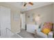 Inviting Bedroom with neutral tones, a comfortable glider, and sweet decor for a baby's room at 20356 Willowbend Ln, Parker, CO 80138