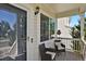 Inviting front porch with seating, perfect for enjoying a quiet morning or evening at 20356 Willowbend Ln, Parker, CO 80138