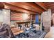 Finished basement featuring a workout area, unique art, and open ceiling at 5332 W Roxbury Pl, Littleton, CO 80128