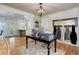 Open home office with a view into the kitchen and hardwood floors at 5332 W Roxbury Pl, Littleton, CO 80128