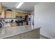 Kitchen with stainless steel appliances and granite countertops at 11673 Josephine St, Thornton, CO 80233