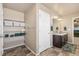 Bathroom featuring a double vanity, tile floors and lots of storage at 567 Jewel St, Brighton, CO 80603