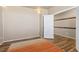 Spacious bedroom featuring hardwood floors, neutral walls, and a spacious closet at 567 Jewel St, Brighton, CO 80603