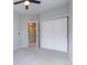 Cozy bedroom with light grey walls, carpeted floors and closet space at 15443 W 65Th Ave # B, Arvada, CO 80007
