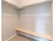 Walk-in closet featuring a custom shelf and hanging rods, perfect for organization at 15443 W 65Th Ave # B, Arvada, CO 80007
