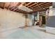 This unfinished basement features exposed beams and plumbing at 5370 S Sherman St, Littleton, CO 80121