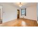 Spacious bedroom with hardwood floors and large windows at 5370 S Sherman St, Littleton, CO 80121