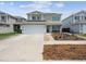 Charming two-story house with manicured landscaping and an attached garage at 20765 E 39Th Ave, Denver, CO 80249