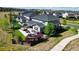 Aerial view of house, showcasing backyard patio and landscaping at 26994 E Indore Ave, Aurora, CO 80016