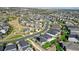 Neighborhood featuring numerous houses and green spaces at 26994 E Indore Ave, Aurora, CO 80016