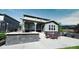 Outdoor patio with built-in grill, seating area, and fire pit at 26994 E Indore Ave, Aurora, CO 80016
