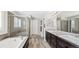 Elegant bathroom with double vanity and large shower at 26994 E Indore Ave, Aurora, CO 80016