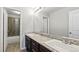 Bathroom with double vanity and updated fixtures at 26994 E Indore Ave, Aurora, CO 80016