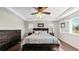 Spacious bedroom with wood floors and large windows at 26994 E Indore Ave, Aurora, CO 80016