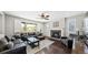 Relaxing living room with a gas fireplace and comfortable leather seating at 26994 E Indore Ave, Aurora, CO 80016