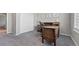 Home office with built-in desk and ample storage at 26994 E Indore Ave, Aurora, CO 80016