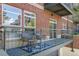 Comfortable balcony with outdoor seating, metal railings, and scenic views of the surrounding neighborhood at 10184 Park Meadows Dr # 1102, Lone Tree, CO 80124
