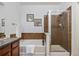 This bathroom features a shower stall, a tub, and a vanity with a sink for your convenience at 10184 Park Meadows Dr # 1102, Lone Tree, CO 80124