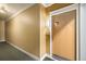Hallway and front door featuring a light fixture and a shelf at 10184 Park Meadows Dr # 1102, Lone Tree, CO 80124