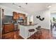 Stylish kitchen with granite countertops, stainless steel appliances, and breakfast bar seating at 10184 Park Meadows Dr # 1102, Lone Tree, CO 80124