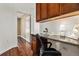 This stylish office features hardwood floors, a built-in desk, and plenty of natural light at 10184 Park Meadows Dr # 1102, Lone Tree, CO 80124