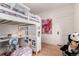 Creative loft bedroom includes a desk and ample space for activities at 2664 Dahlia St, Denver, CO 80207