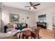 Comfortable living room featuring hardwood floors, ceiling fan and neutral colors at 2664 Dahlia St, Denver, CO 80207