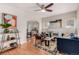 Cozy living room featuring hardwood floors, an archway and comfortable seating at 2664 Dahlia St, Denver, CO 80207