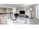 Cozy loft area with comfortable seating, television, and stylish decor at 9592 Keystone Trl, Parker, CO 80134