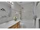 Bright bathroom with a sink and bathtub/shower combo at 4924 S Flower Way, Littleton, CO 80123