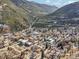 Breathtaking aerial view of the town nestled in the mountains, surrounded by lush greenery at 710 6Th St, Georgetown, CO 80444