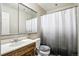 Bathroom features a sink, mirror, toilet, and shower at 710 6Th St, Georgetown, CO 80444