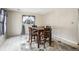 Dining room features a table, chairs, and window at 710 6Th St, Georgetown, CO 80444