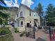 Charming yellow commercial building with outdoor seating and clear mountain views at 710 6Th St, Georgetown, CO 80444