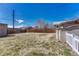 Large backyard with a privacy fence, offering ample space for recreation and gardening at 3090 W Longfellow Pl, Denver, CO 80221