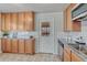 Well-equipped kitchen with granite countertops, and ample cabinet space at 3090 W Longfellow Pl, Denver, CO 80221