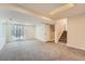 Finished basement featuring neutral carpet, recessed lights, and stairs at 9383 Cobblecrest Dr, Highlands Ranch, CO 80126