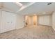 Finished basement featuring carpeted floor, recessed lighting, and white doors at 9383 Cobblecrest Dr, Highlands Ranch, CO 80126