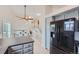 Spacious kitchen featuring stainless steel appliances and seamless transition into a bright dining area at 9383 Cobblecrest Dr, Highlands Ranch, CO 80126