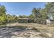 This backyard is fenced and has mature trees at 5330 S Windermere St, Littleton, CO 80120