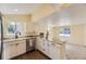 Well-lit kitchen with granite counters, stainless appliances, and modern fixtures at 5330 S Windermere St, Littleton, CO 80120