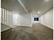 Spacious finished basement with neutral carpet, recessed lighting, and a window at 9668 Salem Ct, Highlands Ranch, CO 80130