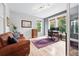 Bright home office with hardwood floors, natural light, and dedicated workspace, ideal for remote work at 8276 E 28Th Dr, Denver, CO 80238